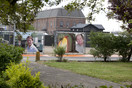 Portretfoto's langs looproute koning Willem-Alexander en koningin Maxima tijdens bezoek aan Hembrugterrein in Zaanstad op 14 juni 2013